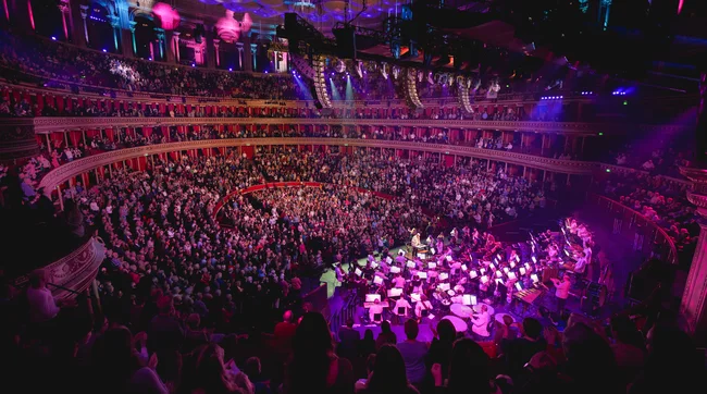 Royal Albert Hall auditorium with a full orchestra on stage