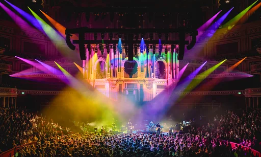 Royal Albert Hall with multiple colour lights on the organ